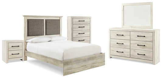 Cambeck King Upholstered Panel Bed with Mirrored Dresser, Chest and Nightstand